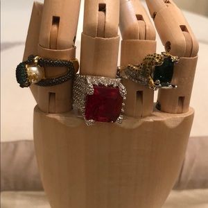 Three size six unusual costume dinner rings.